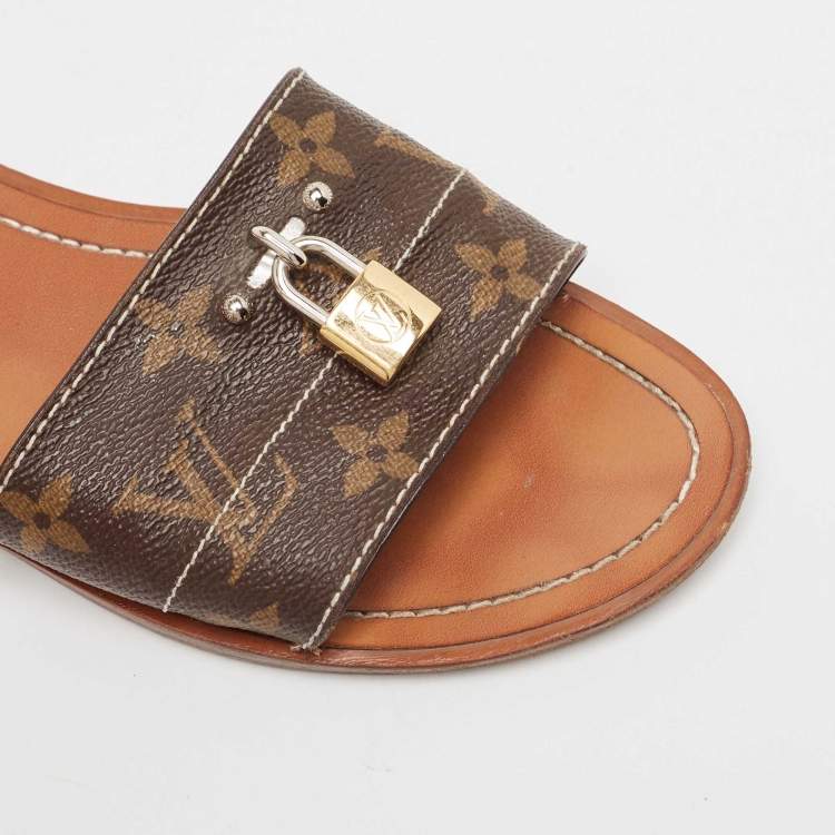 Pre Owned Louis Vuitton Brown Monogram Canvas Lock It  Flat Slides Size 37.5