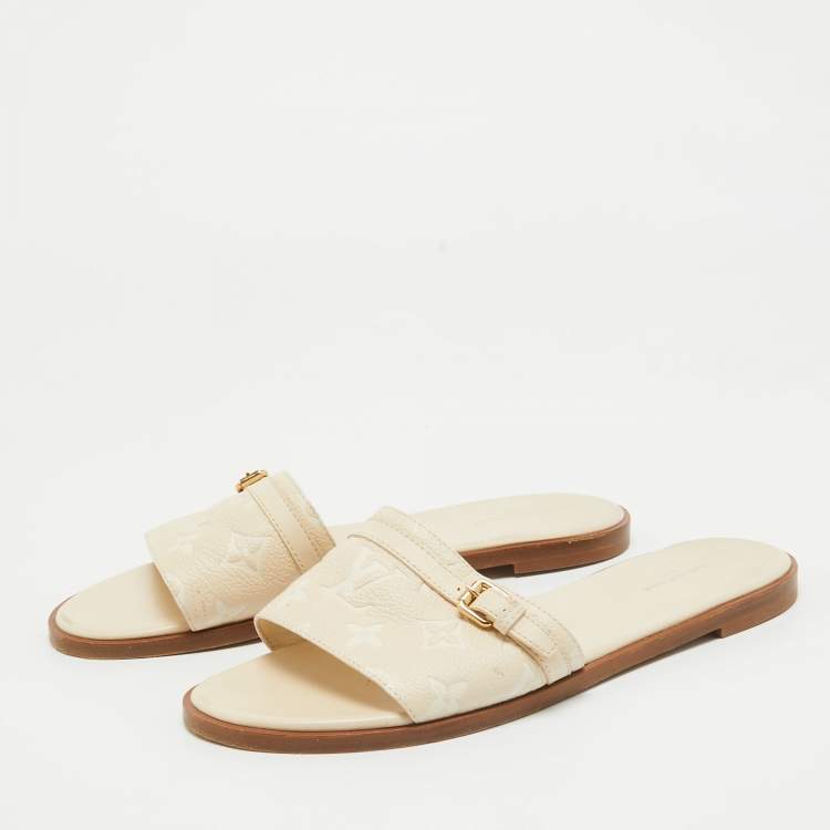 Pre Owned Louis Vuitton Cream Monogram Embossed Leather Flat Slides Size 40