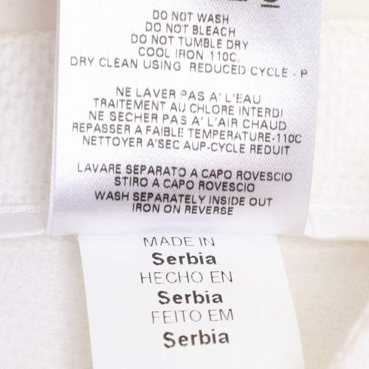 Pre Owned Love Moschino White Textured Cotton Pleated Bottom Mini Skirt M