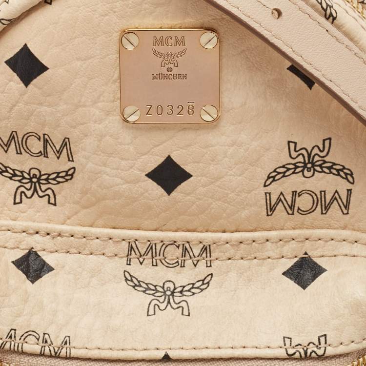 Pre Owned MCM Beige Visetos Coated Canvas and Leather Mini Stark Bebe Boo Backpack