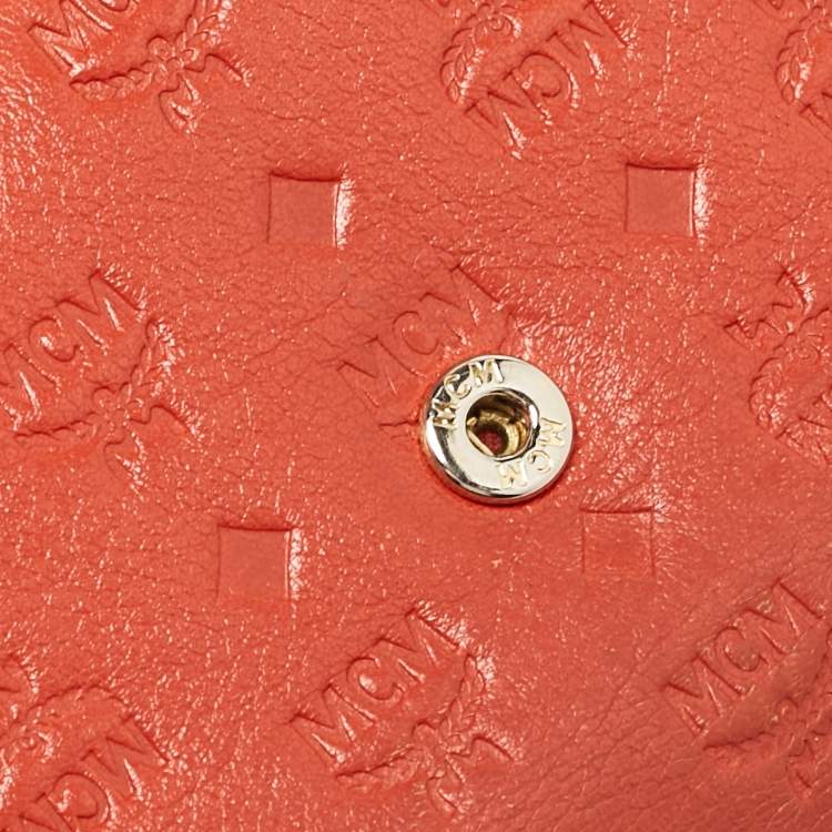 Pre Owned MCM Brick Red Visetos Embossed Leather Trifold Wallet