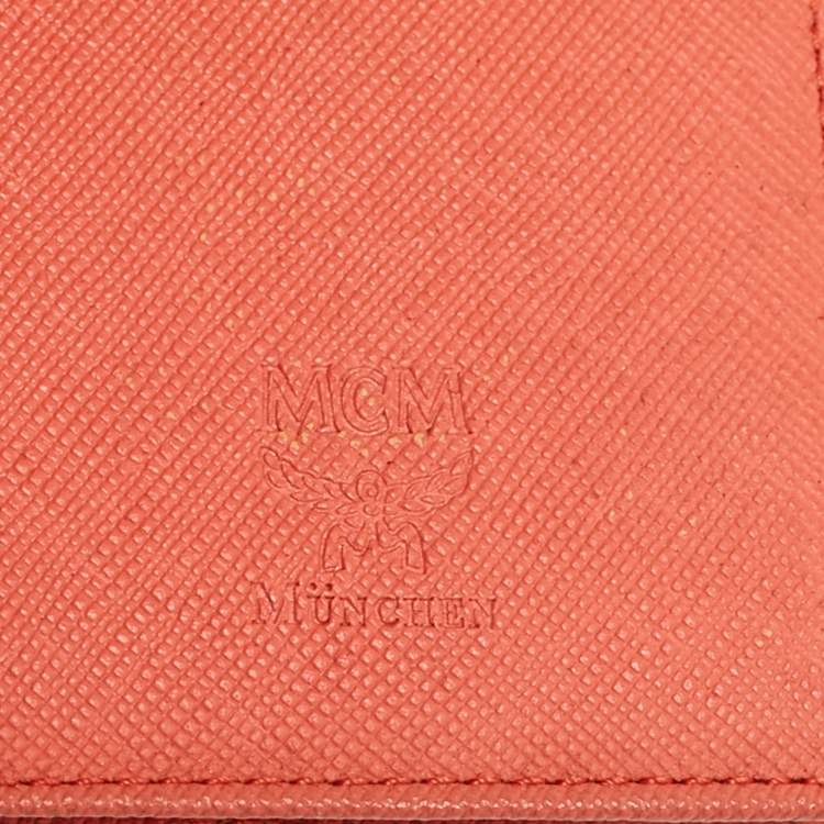 Pre Owned MCM Brick Red Visetos Embossed Leather Trifold Wallet