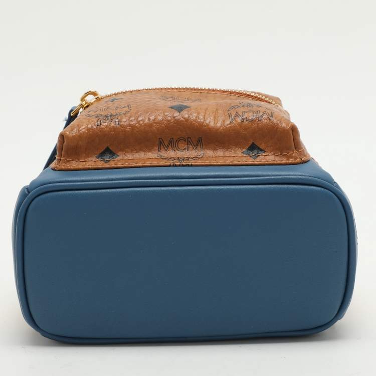 Pre Owned MCM Tan/Blue Cognac Visetos Coated Canvas and Leather Mini Stark Backpack