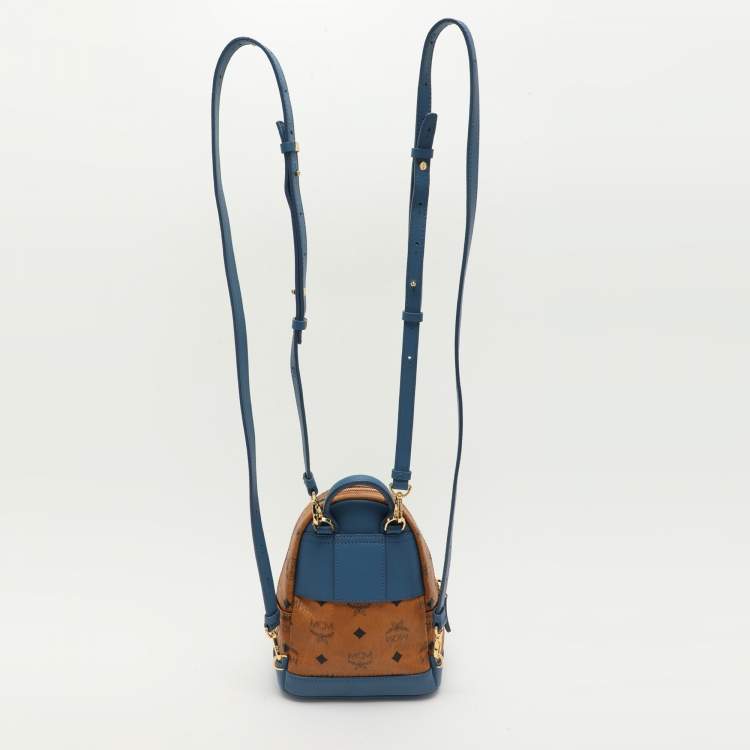 Pre Owned MCM Tan/Blue Cognac Visetos Coated Canvas and Leather Mini Stark Backpack