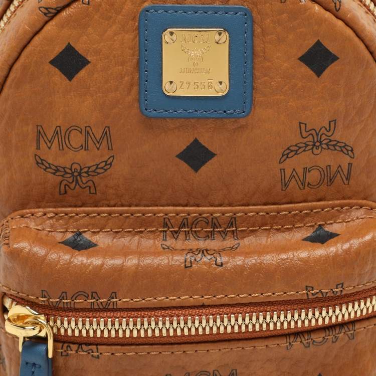 Pre Owned MCM Tan/Blue Cognac Visetos Coated Canvas and Leather Mini Stark Backpack