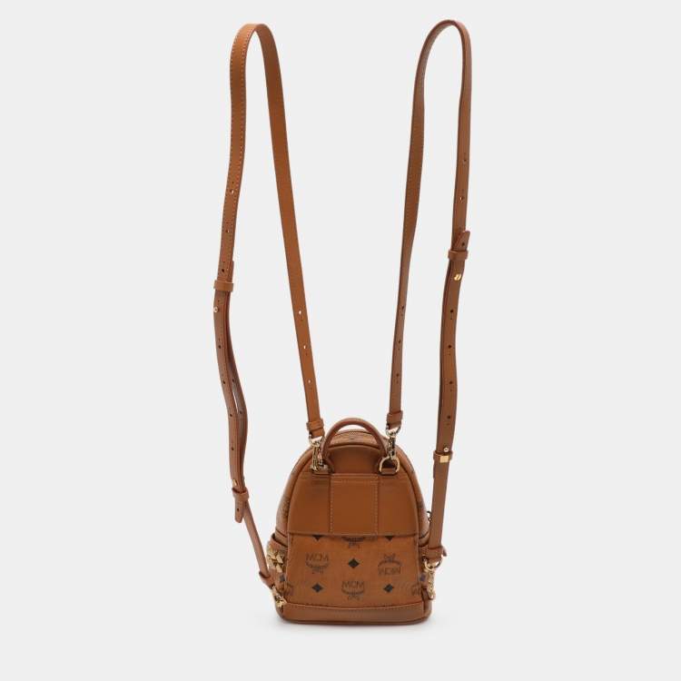 Pre Owned MCM Tan Cognac Visetos Coated Canvas and Leather Mini Stark Backpack