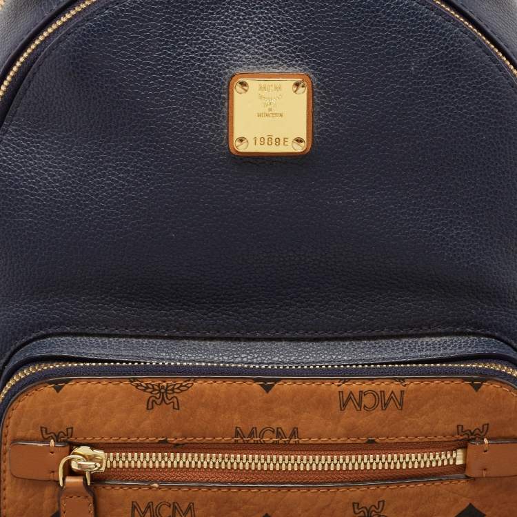 Pre Owned MCM Navy Blue/Tan Leather and Stark Visetos Coated Canvas Backpack