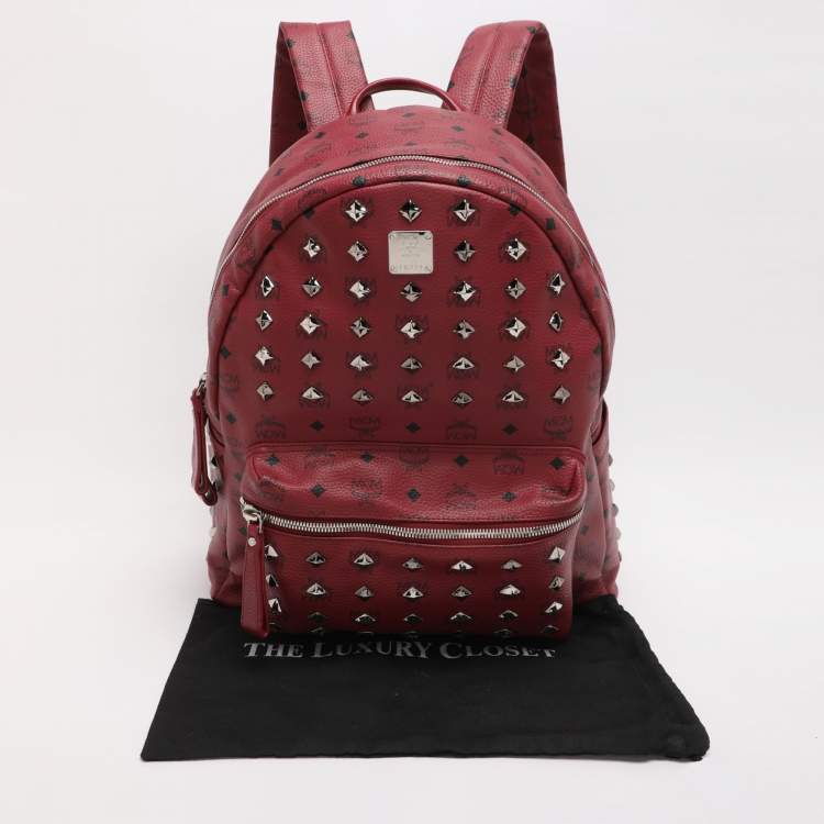 Pre Owned MCM Fuchsia Visetos Coated Canvas Large Studs Stark Backpack