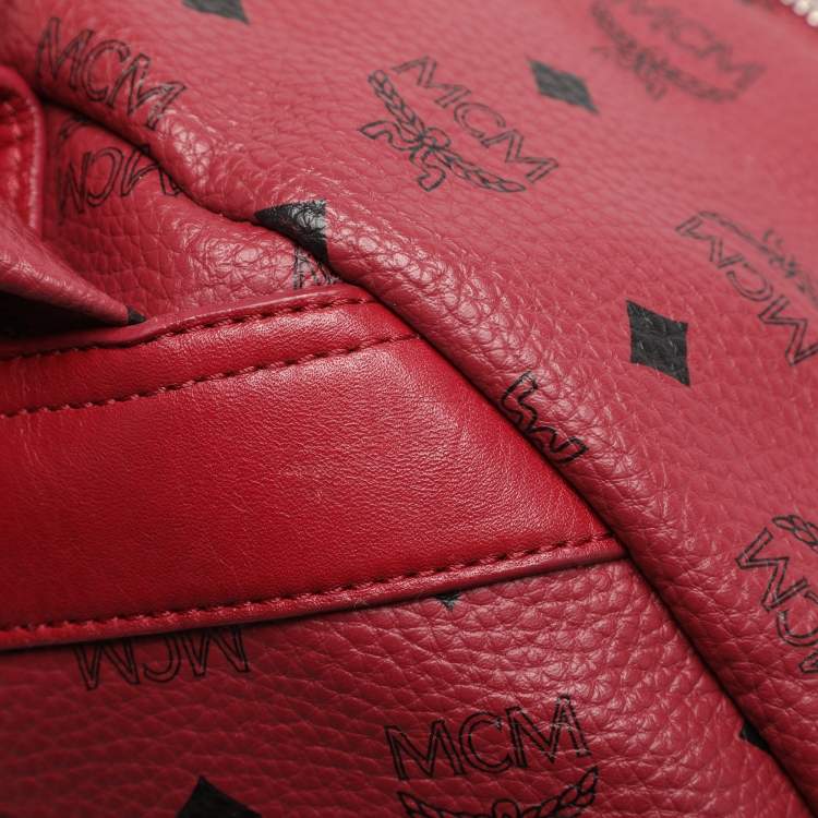 Pre Owned MCM Fuchsia Visetos Coated Canvas Large Studs Stark Backpack