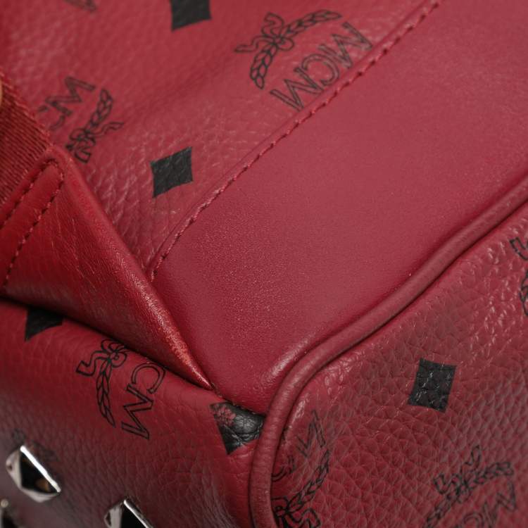 Pre Owned MCM Fuchsia Visetos Coated Canvas Large Studs Stark Backpack