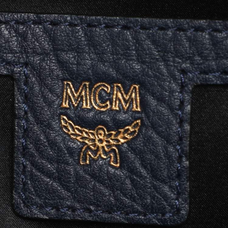 Pre Owned MCM Navy Blue Leather Diamond Studs Stark Backpack