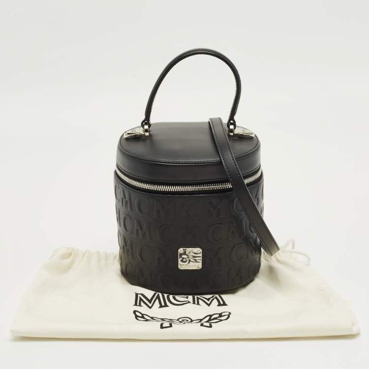 Pre Owned MCM Black Logo Embossed Leather Cylinder Bag