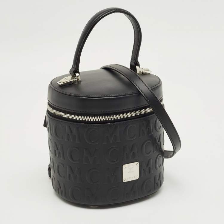Pre Owned MCM Black Logo Embossed Leather Cylinder Bag