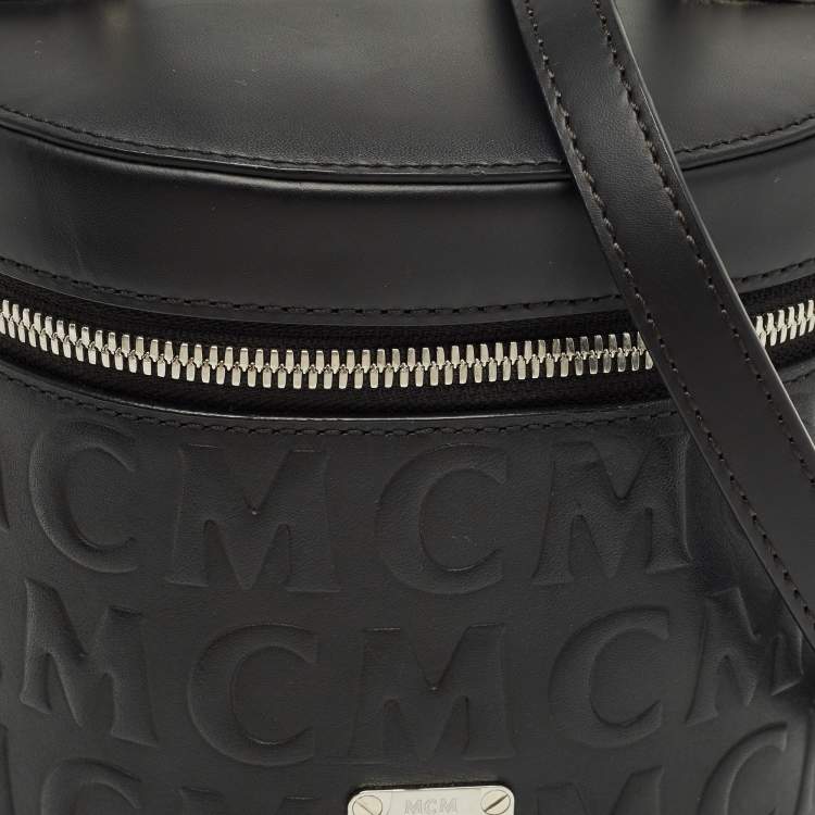 Pre Owned MCM Black Logo Embossed Leather Cylinder Bag