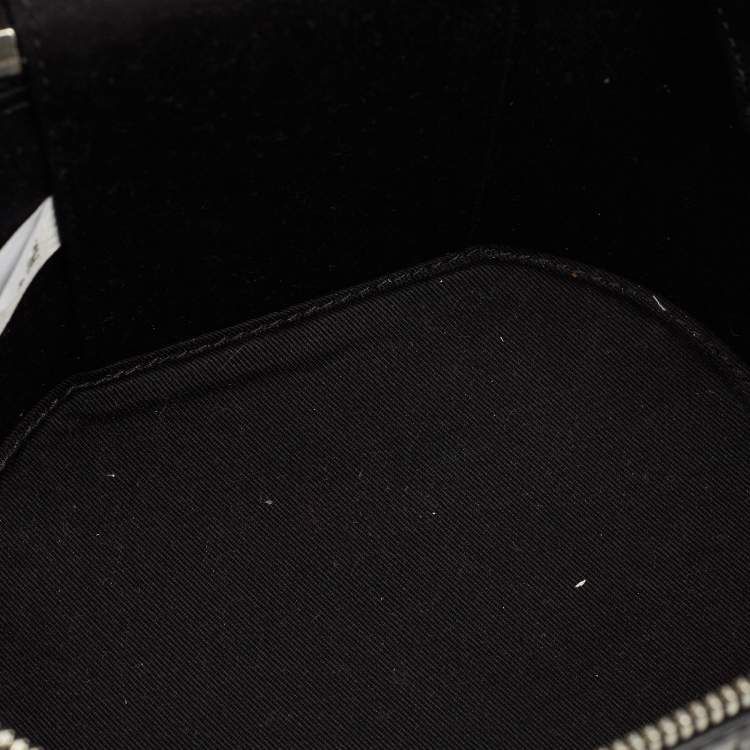 Pre Owned MCM Black Logo Embossed Leather Cylinder Bag