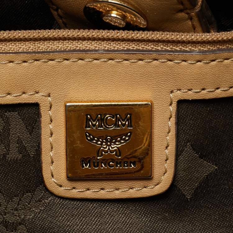 Pre Owned MCM Beige Visetos Coated Canvas Drawstring Tote