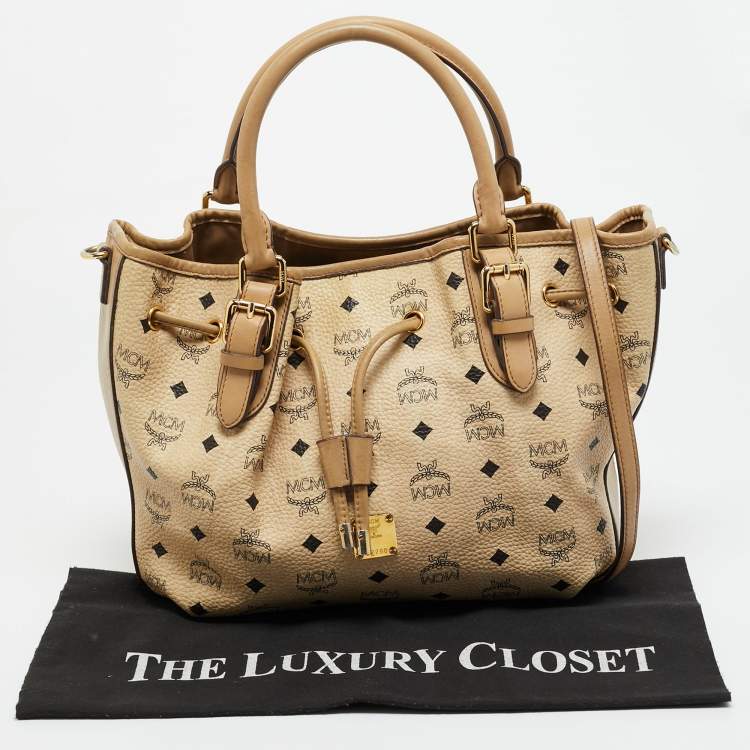 Pre Owned MCM Beige Visetos Coated Canvas Drawstring Tote