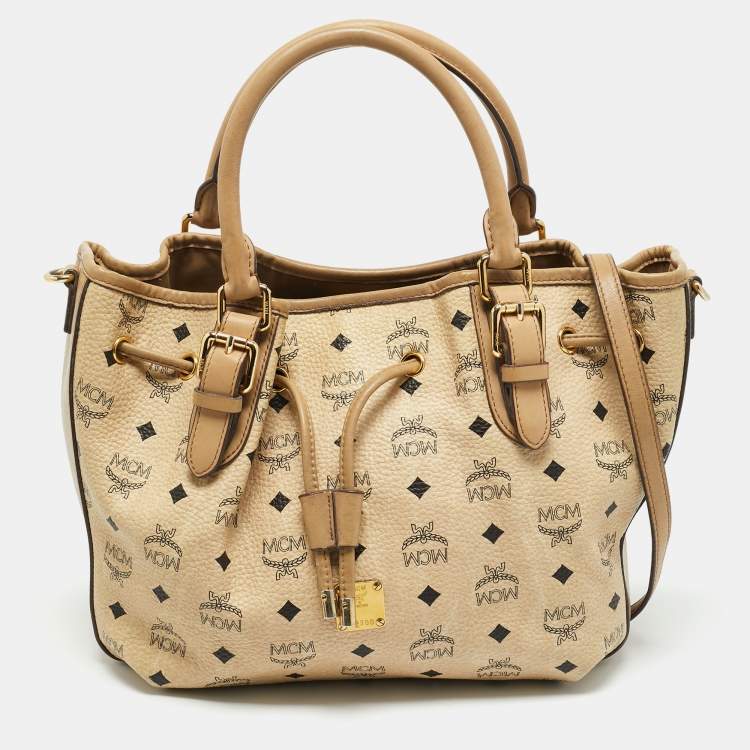 Pre Owned MCM Beige Visetos Coated Canvas Drawstring Tote