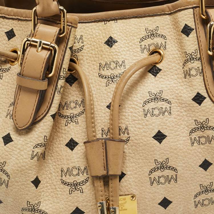 Pre Owned MCM Beige Visetos Coated Canvas Drawstring Tote