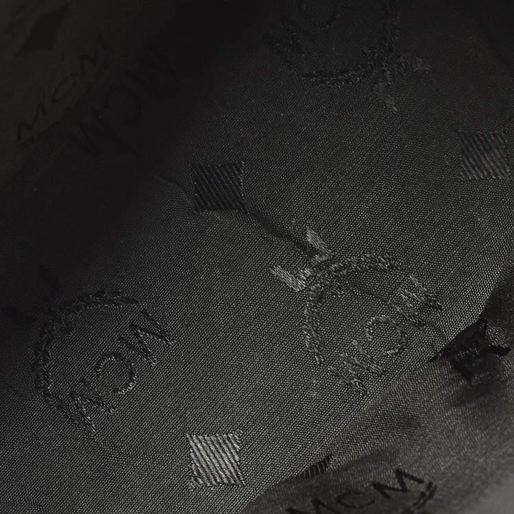 Pre Owned MCM Studded Black Quilted Leather Drawstring Backpack