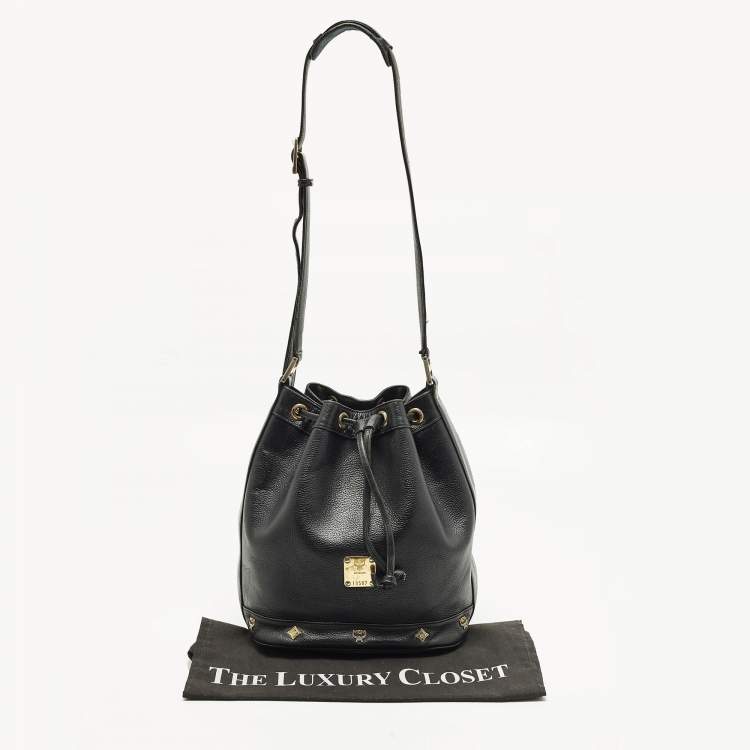 Pre Owned MCM Black Logo Studded Leather Drawstring Bucket Bag