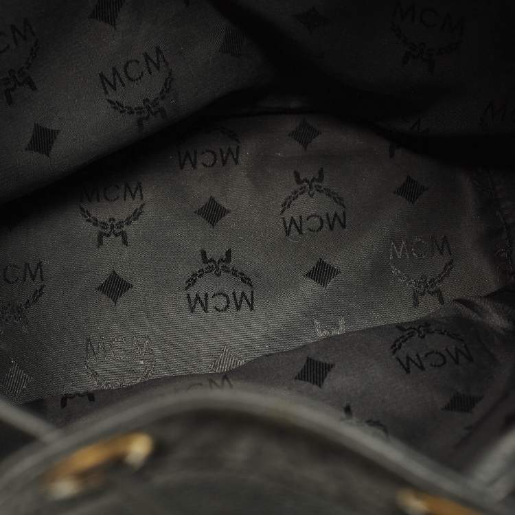 Pre Owned MCM Black Logo Studded Leather Drawstring Bucket Bag