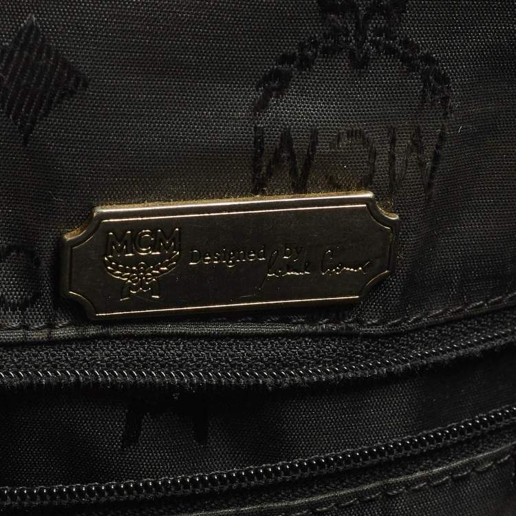 Pre Owned MCM Black Logo Studded Leather Drawstring Bucket Bag