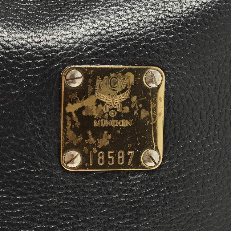 Pre Owned MCM Black Logo Studded Leather Drawstring Bucket Bag