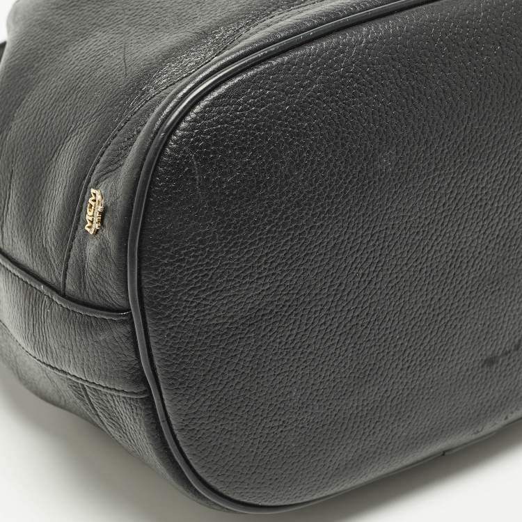 Pre Owned MCM Black Logo Studded Leather Drawstring Bucket Bag