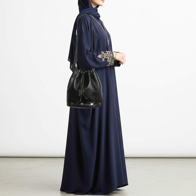 Pre Owned MCM Black Logo Studded Leather Drawstring Bucket Bag