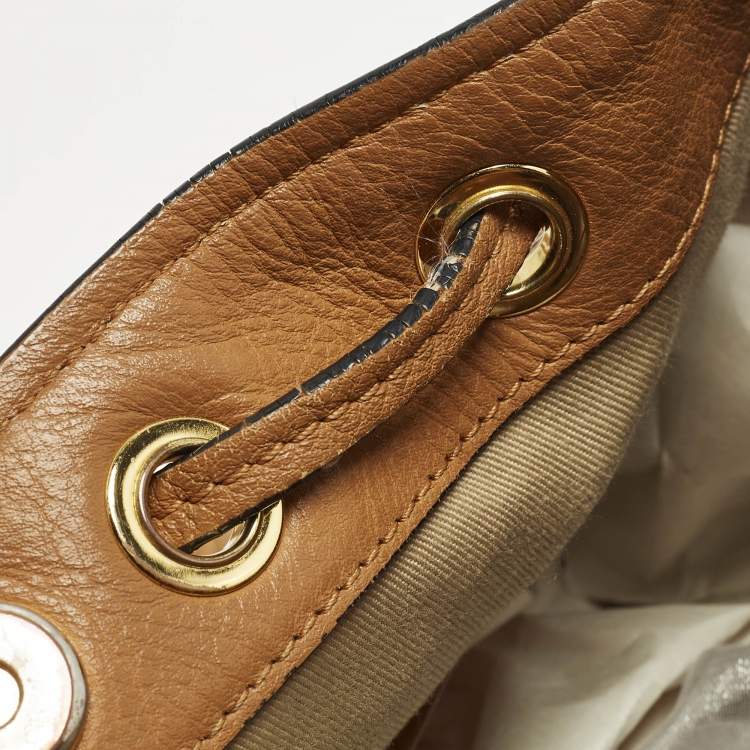 Pre Owned MCM Cognac Visetos Coated Canvas Drawstring Bucket Bag