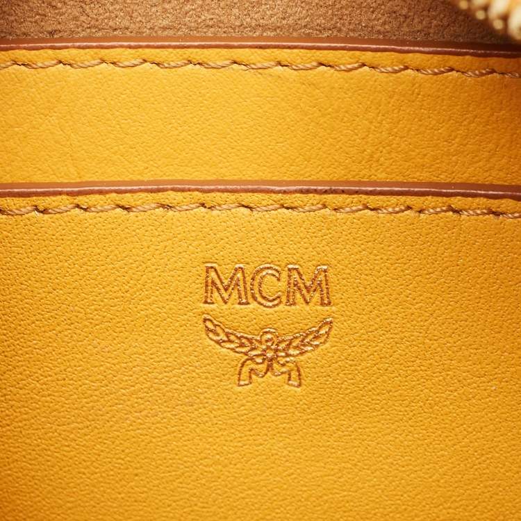 Pre Owned MCM Stark Mini Yellow Leather Studded Backpack