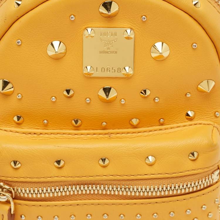 Pre Owned MCM Stark Mini Yellow Leather Studded Backpack
