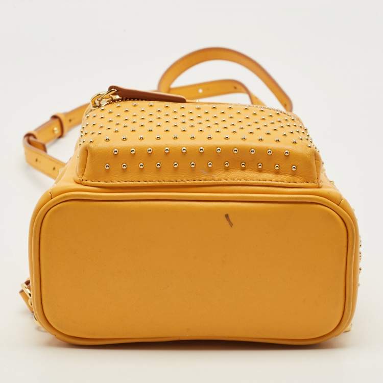 Pre Owned MCM Stark Mini Yellow Leather Studded Backpack