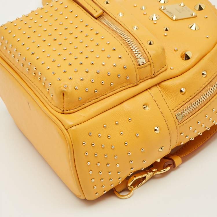 Pre Owned MCM Stark Mini Yellow Leather Studded Backpack