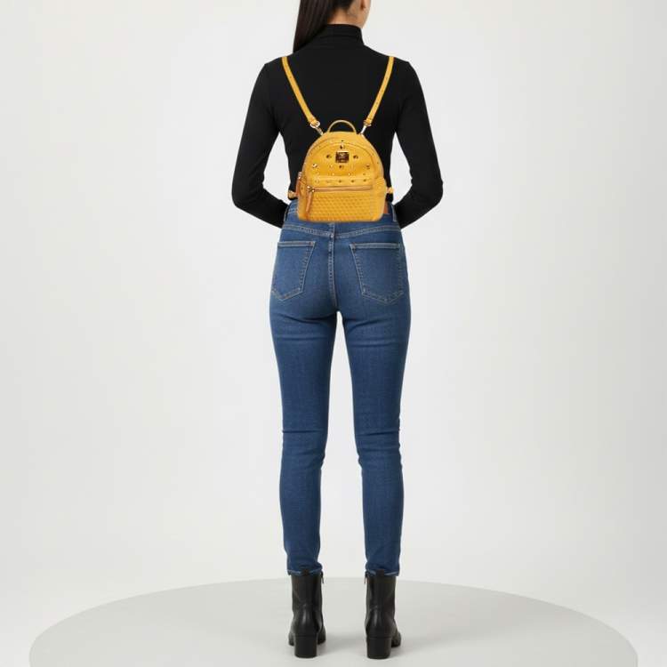 Pre Owned MCM Stark Mini Yellow Leather Studded Backpack