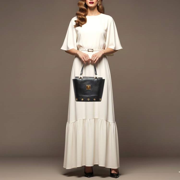 Pre Owned MCM Flap Studded Black Leather Bucket Tote