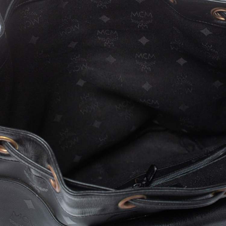Pre Owned MCM Black Signature Nylon and Leather Drawstring Flap Bucket Bag