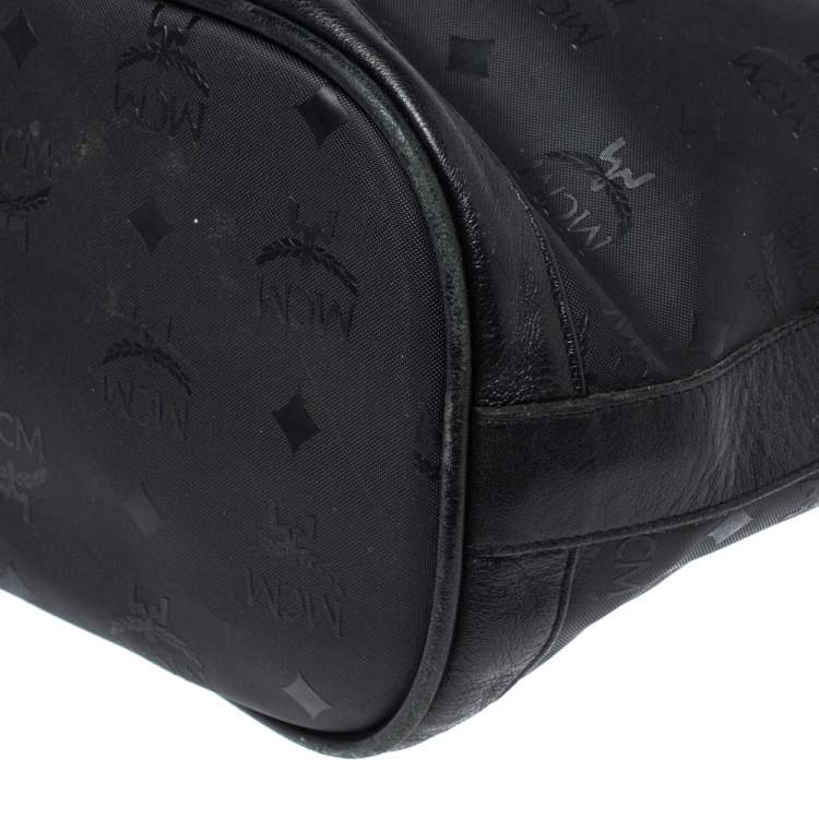 Pre Owned MCM Black Signature Nylon and Leather Drawstring Flap Bucket Bag