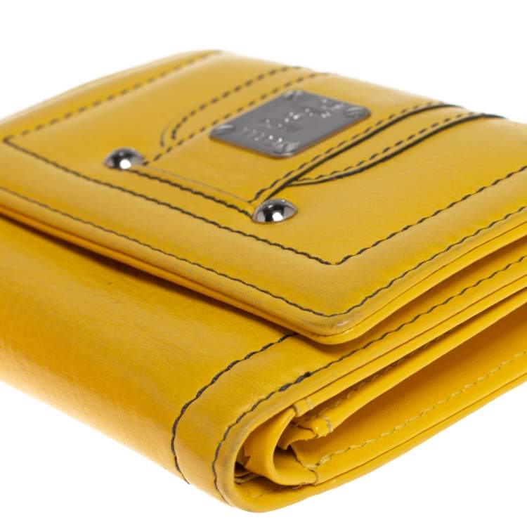 Pre Owned MCM Yellow Leather Tassel Compact Wallet