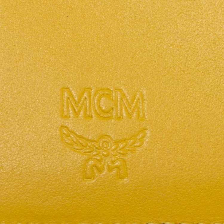 Pre Owned MCM Yellow Leather Tassel Compact Wallet