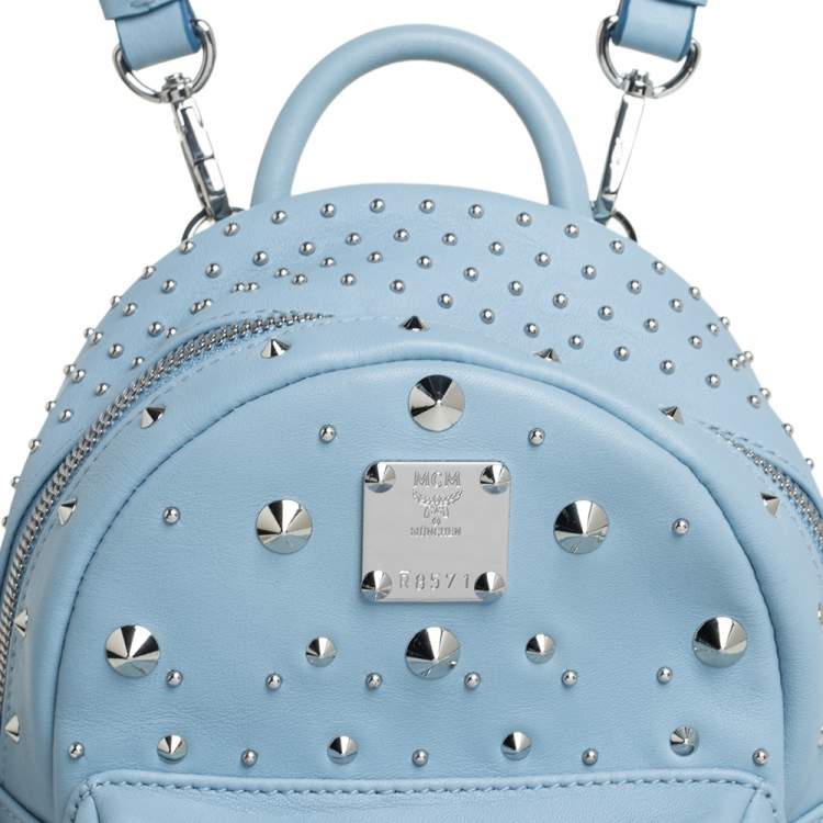 Pre Owned MCM Sky Blue Studded Leather Mini Stark Bebe Boo Backpack