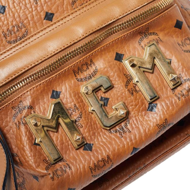 Pre Owned MCM Cognac Visetos Coated Canvas and Leather Trilogie Studded Stark Backpack