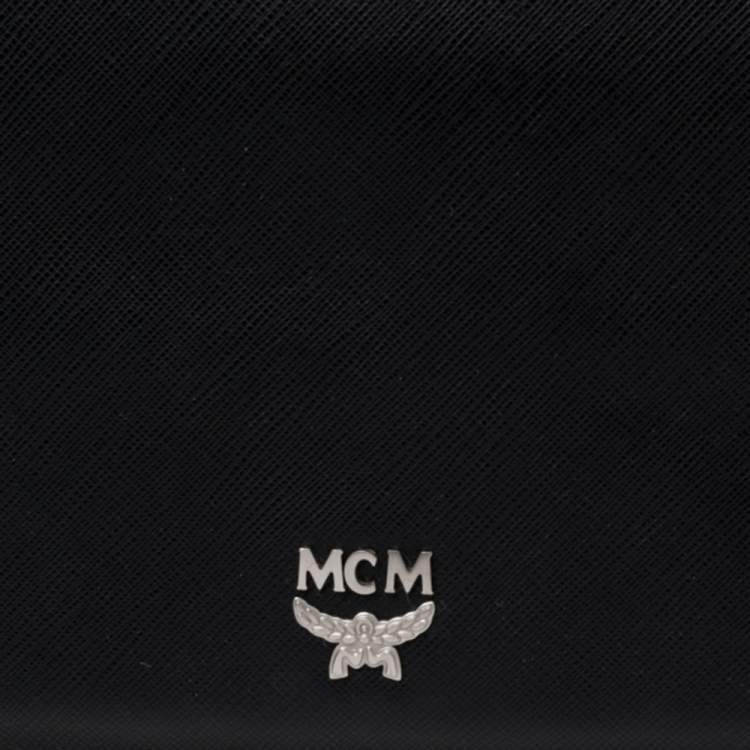 مملوكة مسبقًا MCM Black/White Leather Envelope Clutch