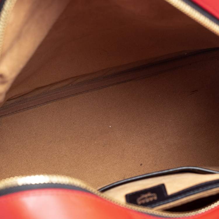 Pre Owned MCM Red Coated Canvas and Leather Stud Embellished Stark Backpack