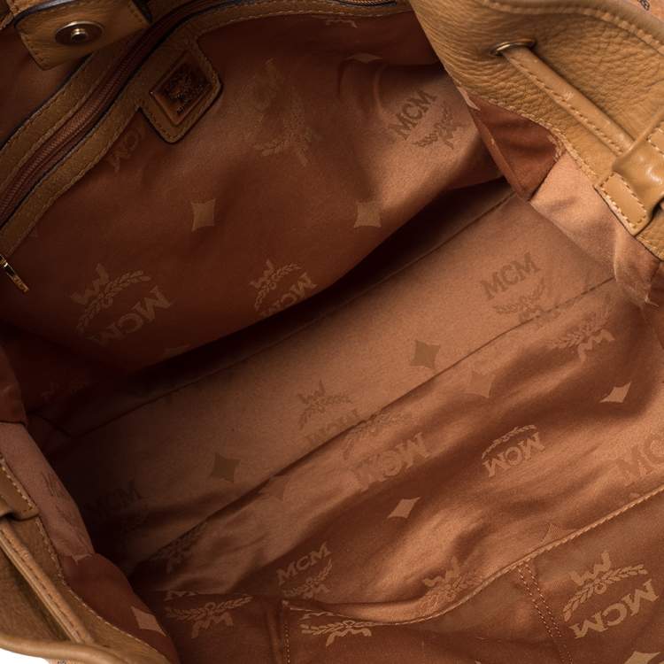 Pre Owned MCM Cognac Visetos Coated Canvas and Leather Drawstring Shoulder Bag