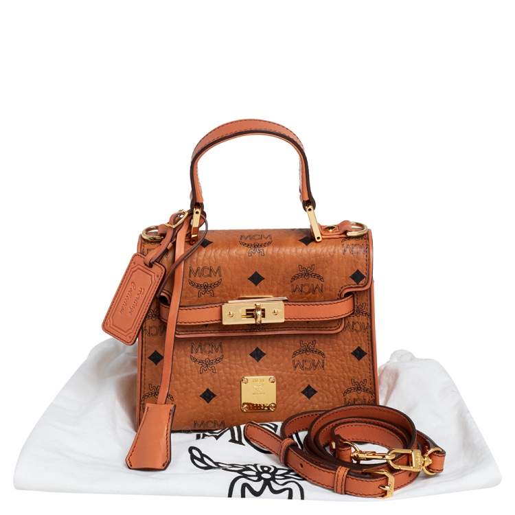 Pre Owned MCM Brown Visetos Coated Canvas and Leather Embellished Mini Heritage Top Handle Bag
