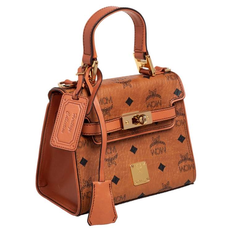 Pre Owned MCM Brown Visetos Coated Canvas and Leather Embellished Mini Heritage Top Handle Bag