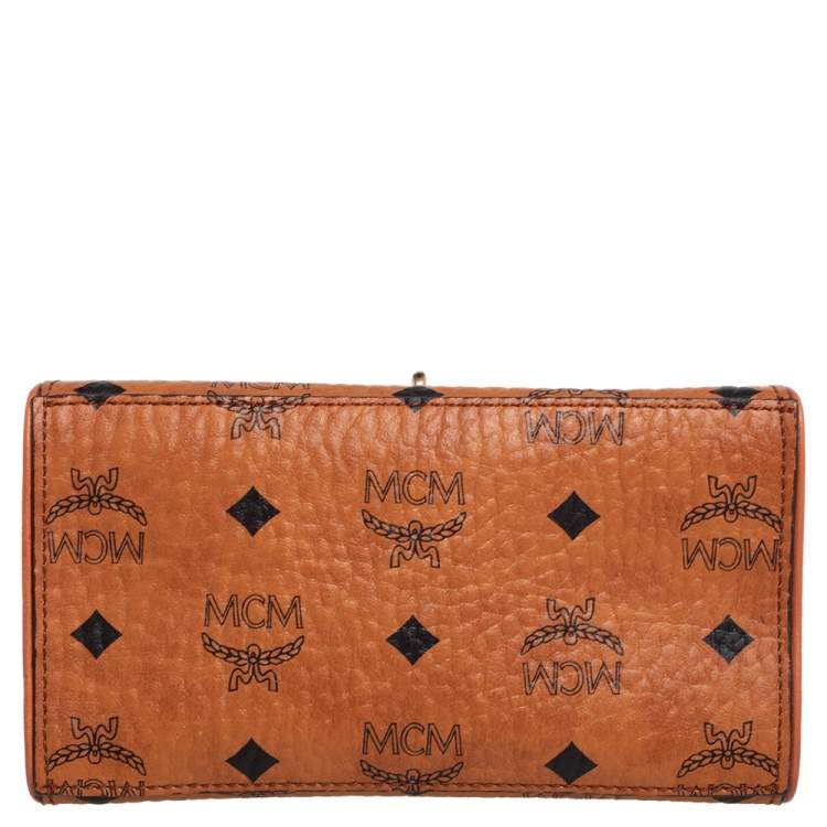 Pre Owned MCM Brown Visetos Coated Canvas and Leather Embellished Mini Heritage Top Handle Bag