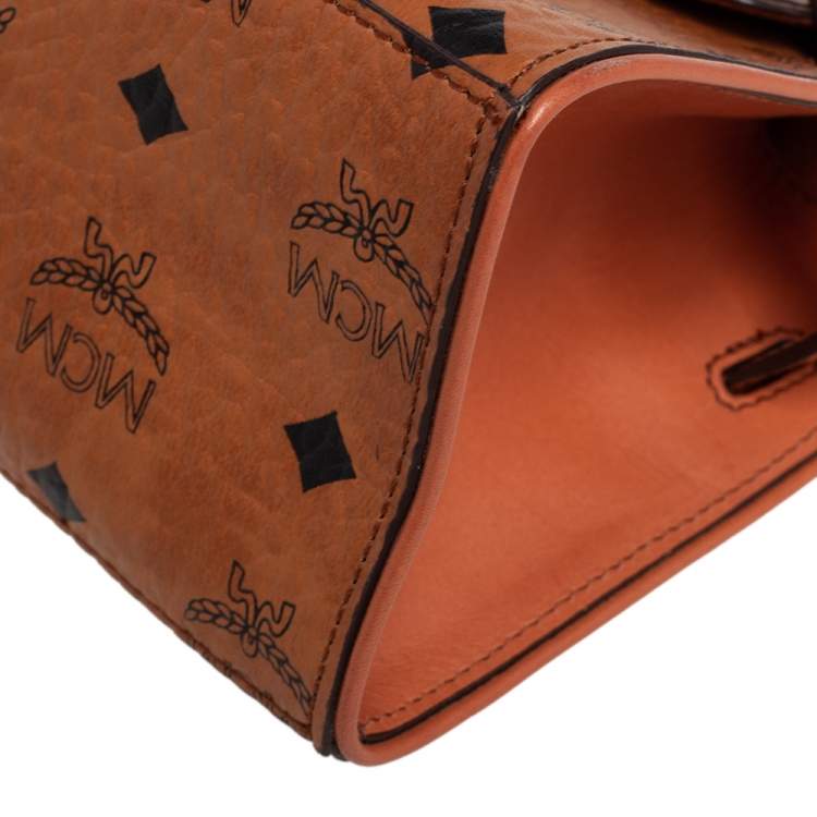 Pre Owned MCM Brown Visetos Coated Canvas and Leather Embellished Mini Heritage Top Handle Bag